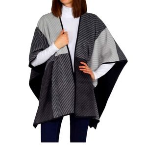 Ike Behar ladies reversible wrap with high pile fleece.  Black and Gray color